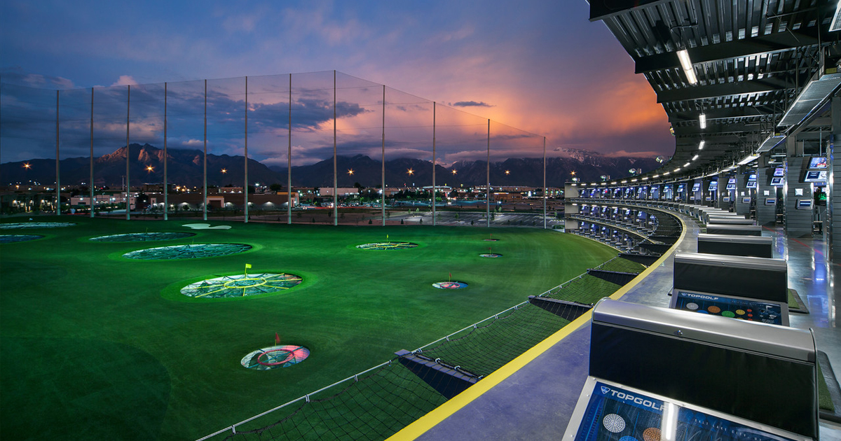 Topgolf hitting bays at sunset at TopGolf Salt Lake City