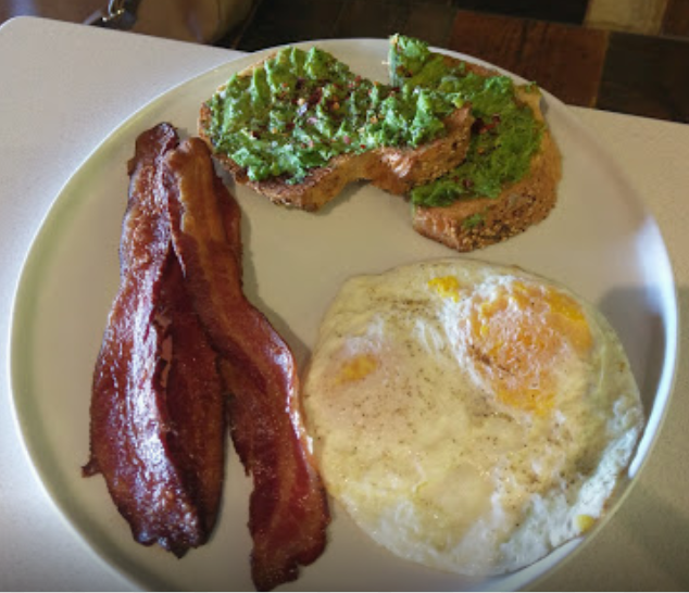 Cubby's Avocado Toast for breakfast with eggs and bacon