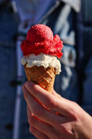 Gelato in a cone held by an ice cream lover in Salt Lake City, Utah