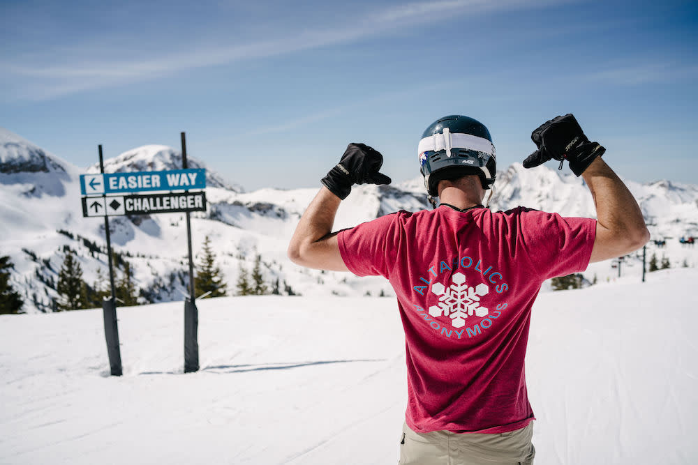 The slopes at Alta Ski Resort, featuring a skier with a great Altaholics Anonymous shirt