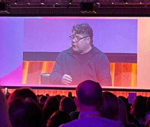 Sean Astin speaking at RootsTech genealogical convention.