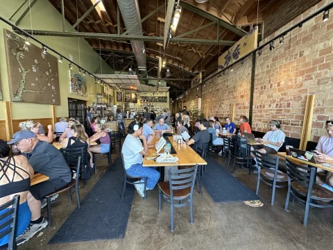 people doing work at a coffee shop 