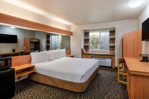 Guest room at Microtel Inn & Suites by Wyndham Salt Lake City Airport, one of the Salt Lake City hotels by airport for quick overnight stays and budget-conscious travelers